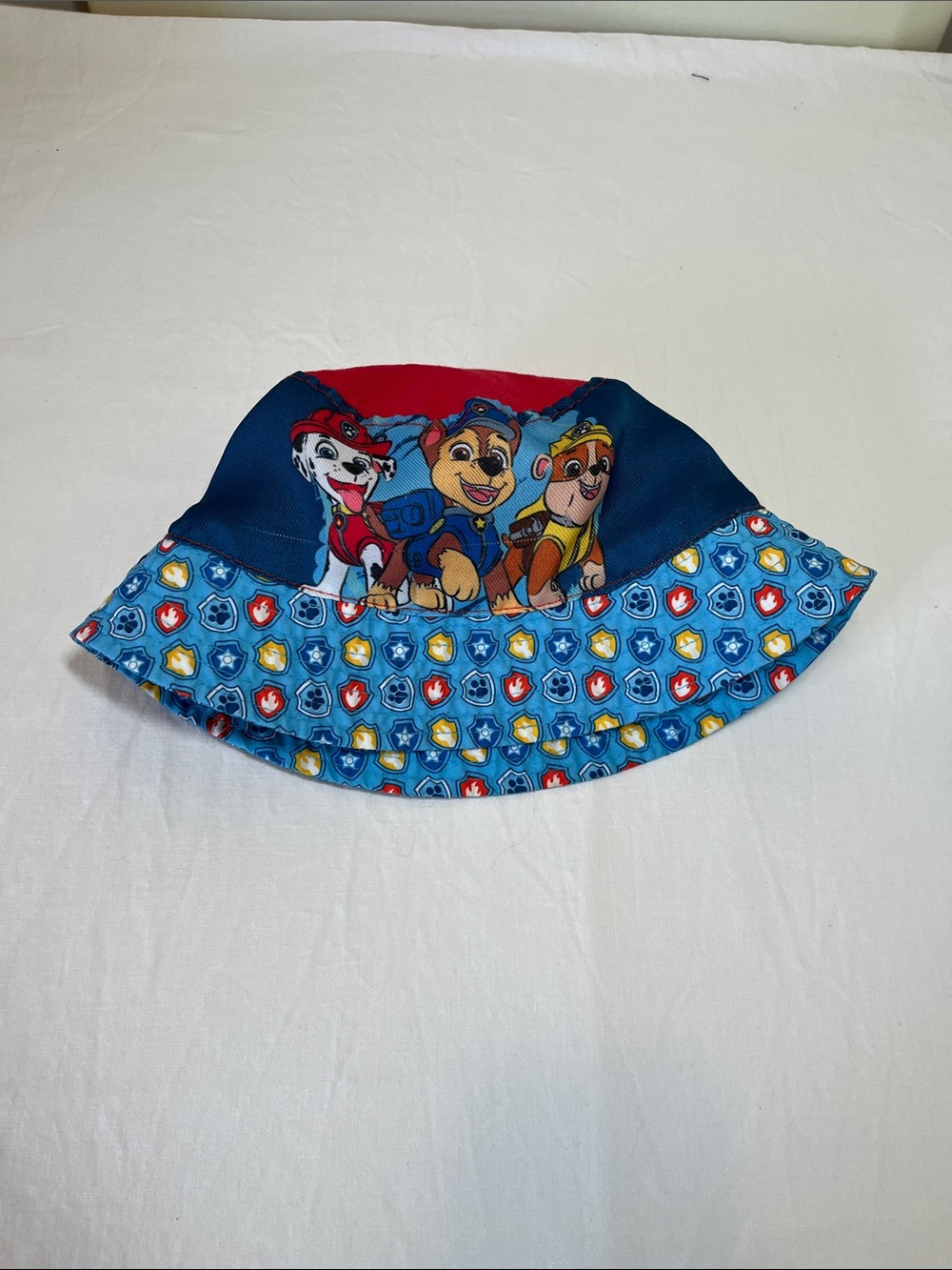 Paw Patrol Blue and Red Kids Bucket Hat with Character Trio, size 4-6x